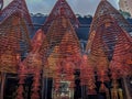 Red Incense coils burning in the Chinese Temple
