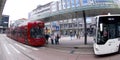 Red Innsbruck tram and white bus Royalty Free Stock Photo
