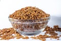 Red integral rice on glass bowl isolated on white background