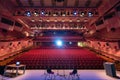 Red interior of empty conference hall. Royalty Free Stock Photo