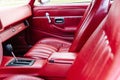 interior is made of red leather of old powerful classic American car Royalty Free Stock Photo
