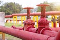 Red iron fire pipe and big valve for water set line up in a long row. It is the big system of Fire management Royalty Free Stock Photo