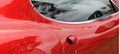 Red italian sports car door handle Royalty Free Stock Photo