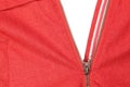 Red jacket with zipper on white background, top view Royalty Free Stock Photo