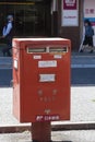 Red japanese letter-box Tokyo Royalty Free Stock Photo