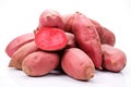 Red Japanese sweet potatoes on a white background