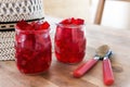 Red jelly, cut into dice, inside two glasses of glass Royalty Free Stock Photo