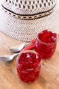 Red jelly, cut into dice, inside two glasses of glass Royalty Free Stock Photo
