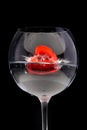 Red jelly heart in wine glass