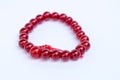 Red Jewellery bracelet armlet on white background