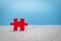 Red jigsaw puzzle. Completing final task, missing jigsaw puzzle pieces and business concept with a puzzle piece missing Royalty Free Stock Photo