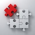Red jigsaw puzzle the last piece stand out from the crowd different concept on white wall background Royalty Free Stock Photo