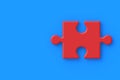 Red jigsaw puzzle piece on blue background. Copy space Royalty Free Stock Photo