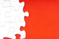 Red jigsaw puzzle pieces on red background. Royalty Free Stock Photo