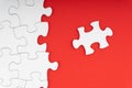 Red jigsaw puzzle pieces on red background. Royalty Free Stock Photo