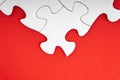 Red jigsaw puzzle pieces on red background. Royalty Free Stock Photo