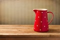 Red jug with dots Royalty Free Stock Photo