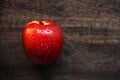 Red apple on a wooden board Royalty Free Stock Photo