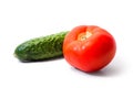 Red juicy tomato and green cucumber. Summer vegetables. food. Royalty Free Stock Photo