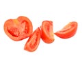Red juicy tomatoes cut on a white background Royalty Free Stock Photo