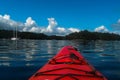 Red Kayak on Montague Harbour. Royalty Free Stock Photo