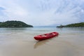 Red kayaking boat on the beach at sea ,koh kood island Thailand Royalty Free Stock Photo