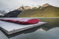 Red kayaks, Lake Louise, Banff National Park, Alberta, Canada