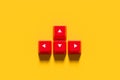 Red keyboard arrow keys showing up, down, left, right directional input on yellow background