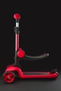 Red Kick Scooter With Adjustable Handlebar, Three-Wheel Design, And Sturdy Deck For Kids Royalty Free Stock Photo
