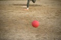 Red kickball approach Royalty Free Stock Photo