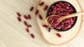 Red kidney beans in a black bowl and spoon on wooden background, top view, flat lay, top-down, selective focus.copy space Royalty Free Stock Photo