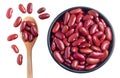 Red kidney beans in a black bowl and spoon on wooden background, top view, flat lay, top-down, selective focus.copy space Royalty Free Stock Photo