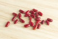 Red kidney beans on wooden background, top view, flat lay, top-down, selective focus.copy space Royalty Free Stock Photo