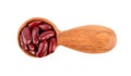 Red kidney beans in wooden spoon, isolated on white background. Rajma or Mexican Bean. Beans close up. Top view. Royalty Free Stock Photo