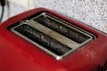 Red kitchen toaster close up, macro photo Royalty Free Stock Photo