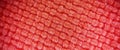 Red knitted fabric in a microscope Royalty Free Stock Photo