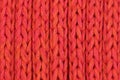 Red knitted fabric texture background macro closeup Royalty Free Stock Photo
