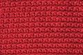 Red knitted fabric texture background. Top view. Copy, empty space for text Royalty Free Stock Photo