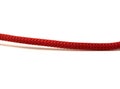 Red knitted rope close-up photo on isolated white background Royalty Free Stock Photo