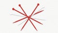 Red Knitting Needles Arranged in Circle Royalty Free Stock Photo