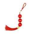 Red knot with tassel, top view photo. Chinese holiday symbol. Red silk knot isolated. Chinese New Year decoration