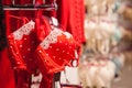 Red lace bra hanging on rack in underwear store. Toned with selective focus Royalty Free Stock Photo