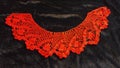 Red lace vintage women& x27;s crocheted collar Royalty Free Stock Photo