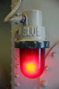 Red lamp, blue embossed and painted fixture