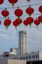 Red lantern decoration with background KOMTAR building at Pulau Pinang.