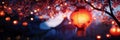 A red lantern hangs from a cherry blossom tree illuminated by string lights The scene is both festive and romantic evoking a Royalty Free Stock Photo