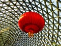 Red lantern on Tropical Exhibition Greenhouse roof Royalty Free Stock Photo