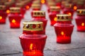 Red lanterns with burning candles close up on granite slabs Royalty Free Stock Photo