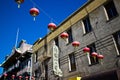 Red Lanterns hang across a street in Chinatown, San Francisco USA