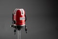 Red laser level tool on grey background Royalty Free Stock Photo